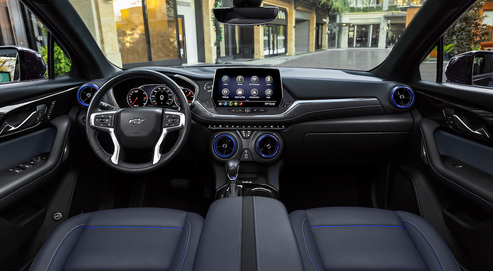 The black and blue interior of a 2024 Chevy Blazer RS.