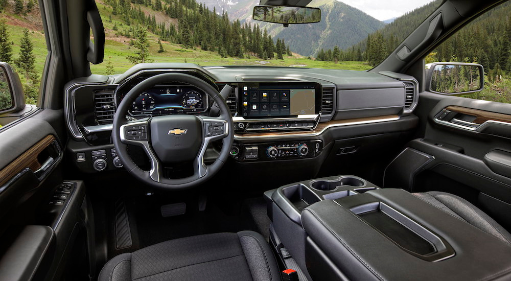 The interior of a 2024 Chevy Silverado LT is shown from the drivers seat.