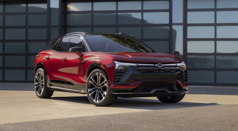 A red 2024 Chevy Blazer EV SS parked outside a building and angled right.