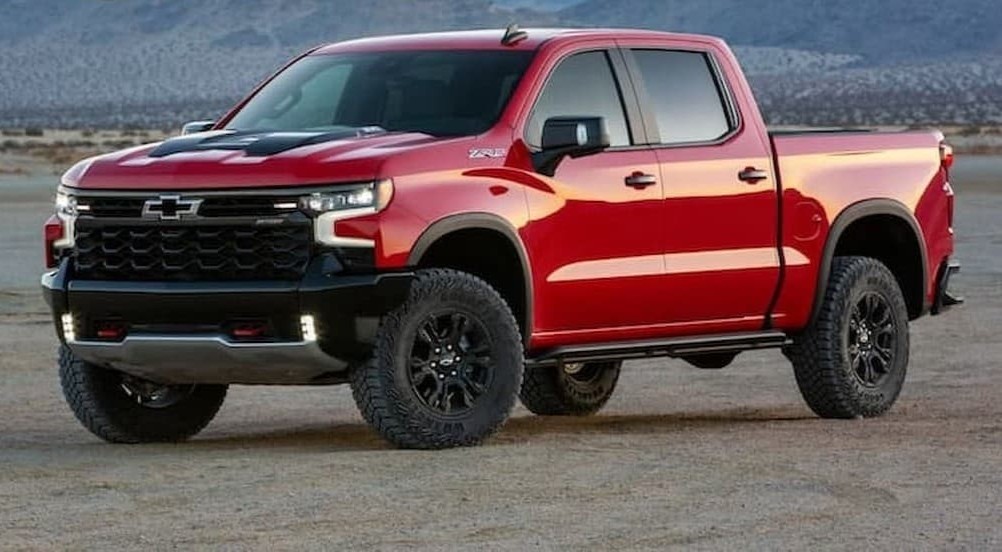 A red 2022 Chevy Silverado 1500 ZR2 parked off-road.