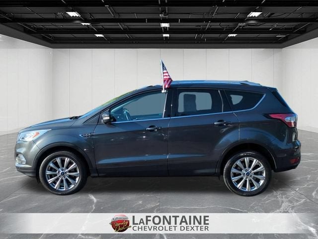Used 2018 Ford Escape Titanium with VIN 1FMCU9J97JUA38947 for sale in Dexter, MI