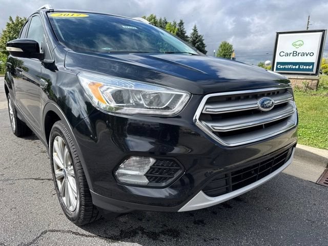 Used 2017 Ford Escape Titanium with VIN 1FMCU9J98HUE71140 for sale in Dexter, MI