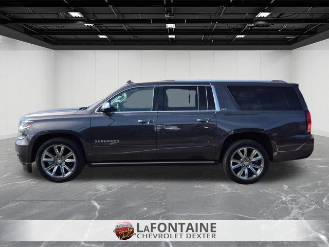 Used 2015 Chevrolet Suburban LTZ with VIN 1GNSKKKC5FR677028 for sale in Dexter, MI