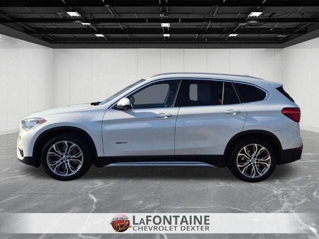 Used 2017 BMW X1 28i with VIN WBXHT3C34H5F84800 for sale in Dexter, MI