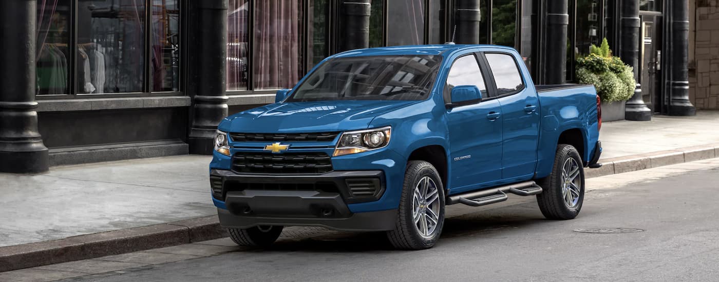 Blue 2022 Chevy Colorado parked in a city