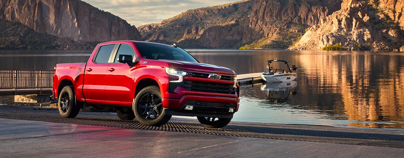 Red 2022 Chevy Silverado 1500 Z71 parked near the water.