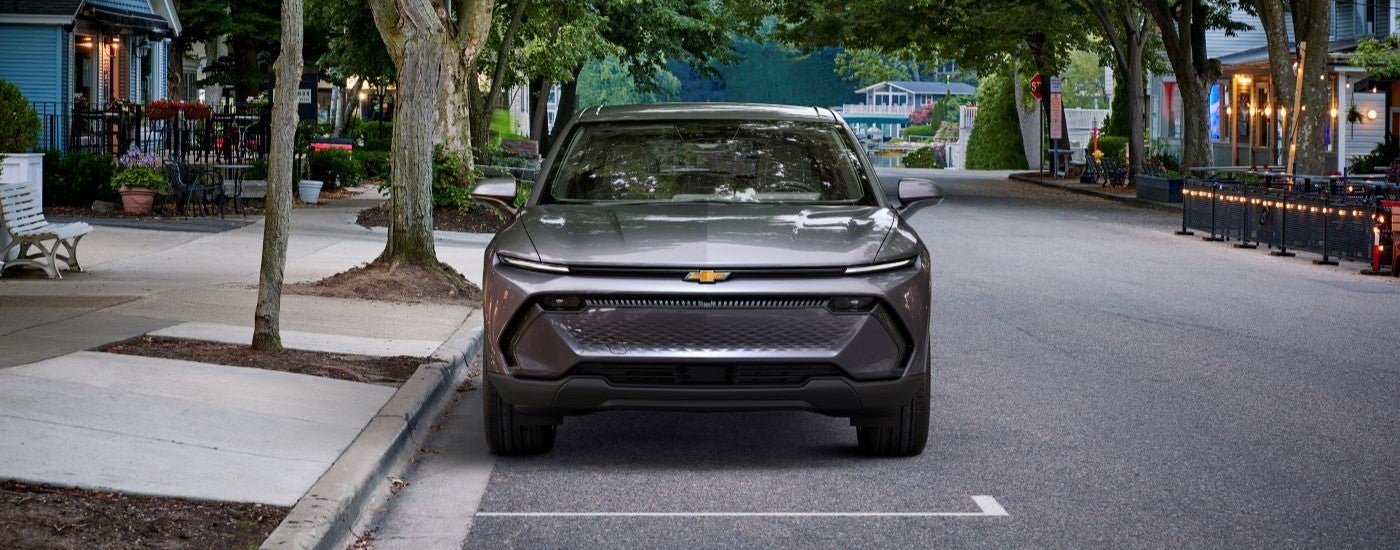Silver 2024 Chevy Equinox EV parked on a city street