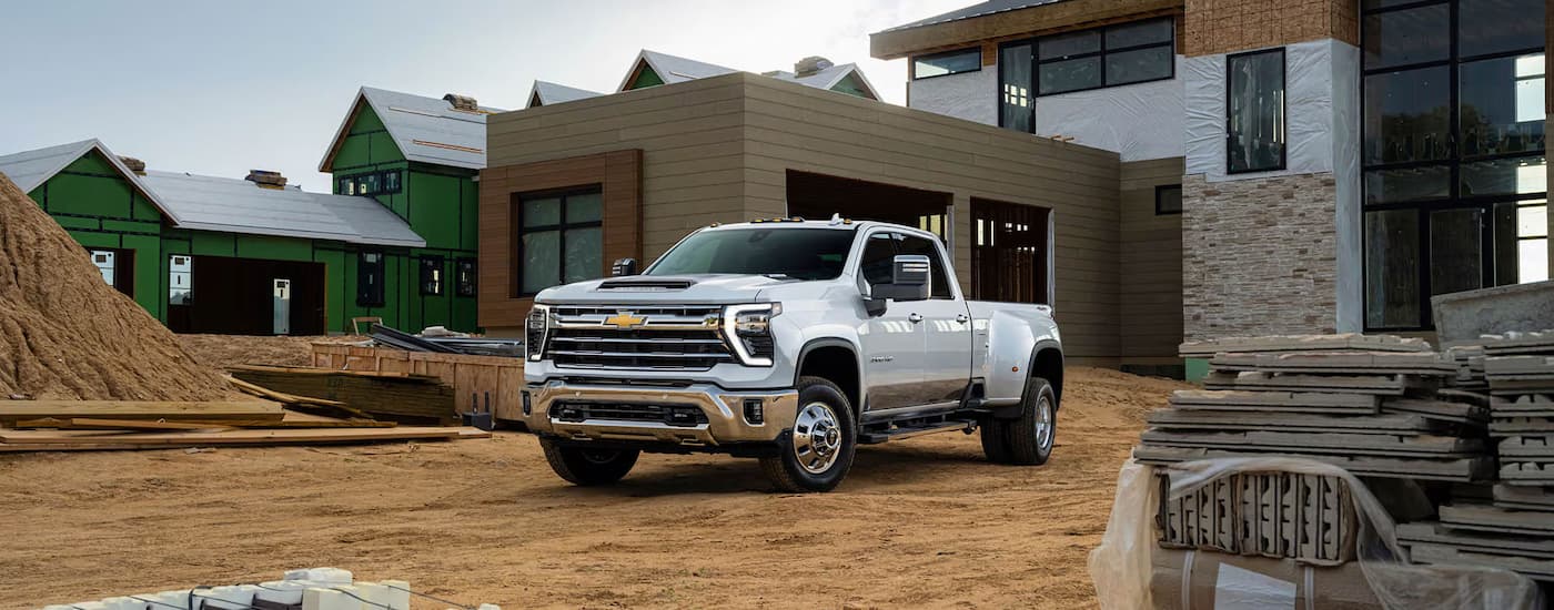 White 2026 Chevy Silverado 3500 HD parked off-road 